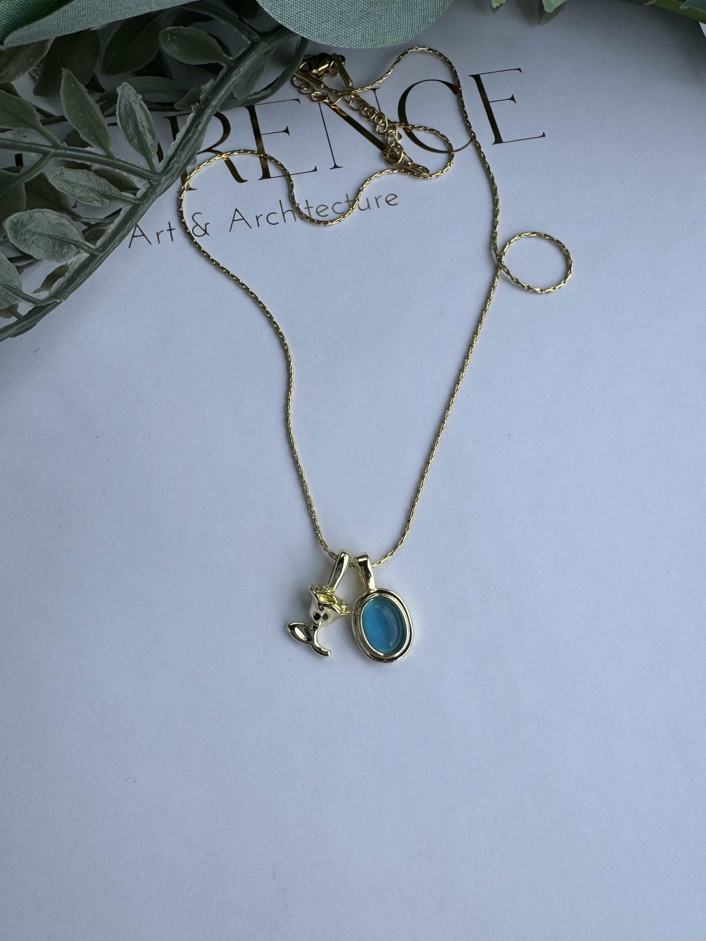 Çelik mavi taşlı çiçek kolye