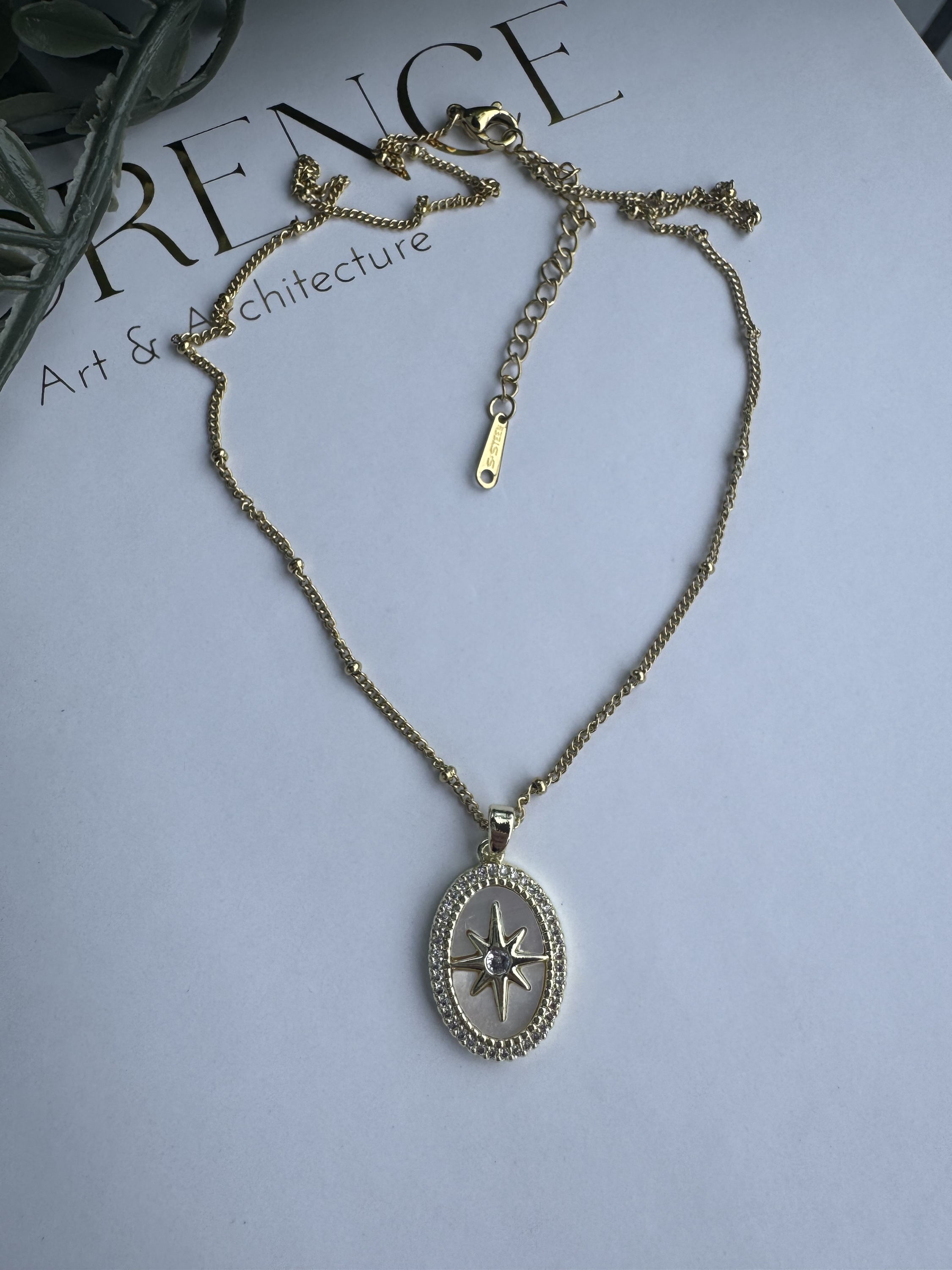 Çelik oval kutup yıldızı pusula kolye