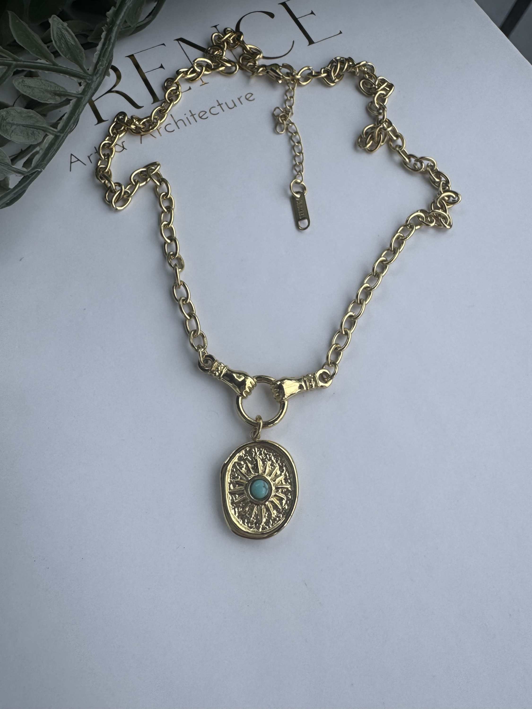 Çelik oval güneş firuzel taş kolye